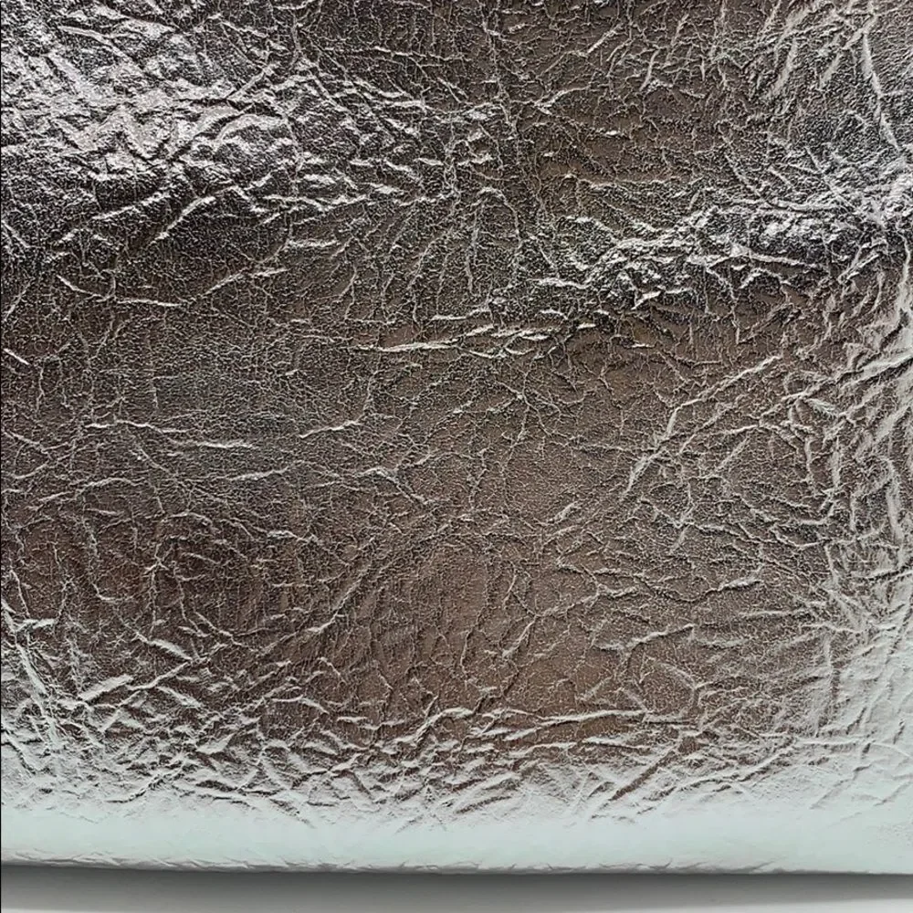 NWT Silver metal foil Cosmetic Bag